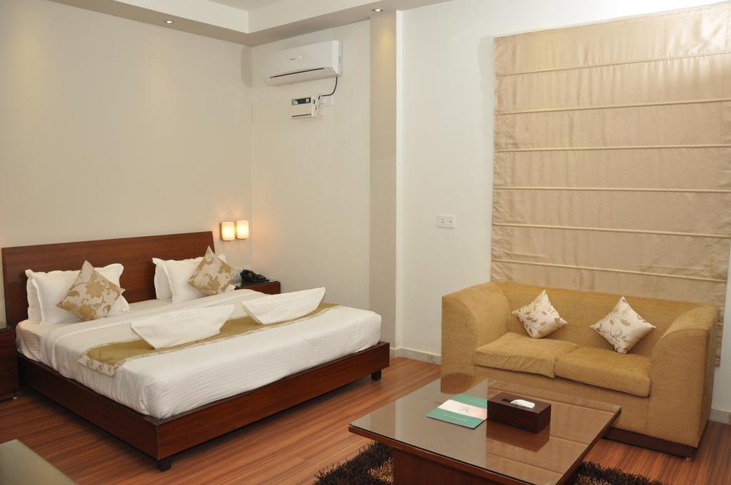Sukhmantra Resort & Spa Candolim Zimmer foto